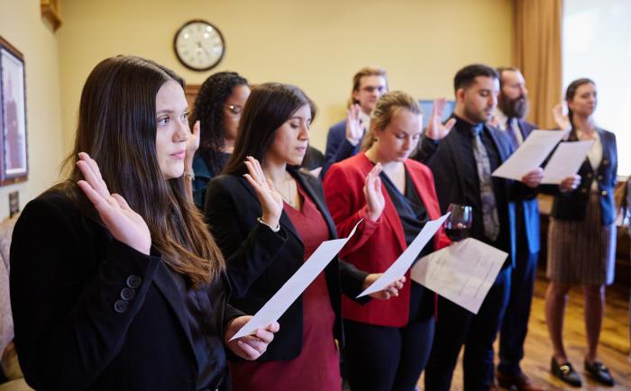 Students taking oath
