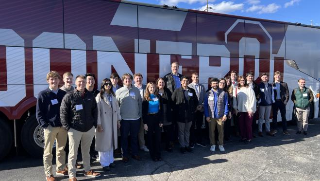 First-year students in front of bus