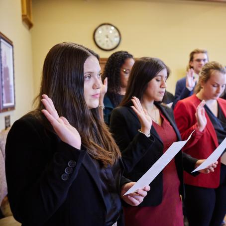 Students taking oath